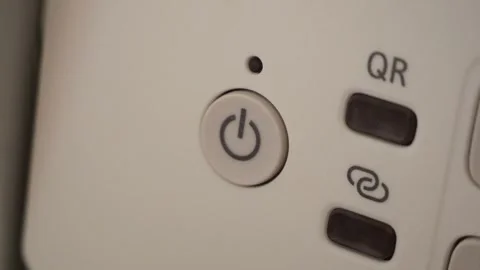 Finger pushing power button on modern device in slow motion Stock Footage 306193381