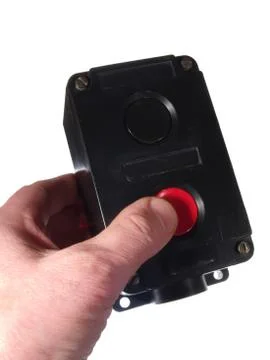 Finger on the red button, the control unit, isolated on white background. Foto stock