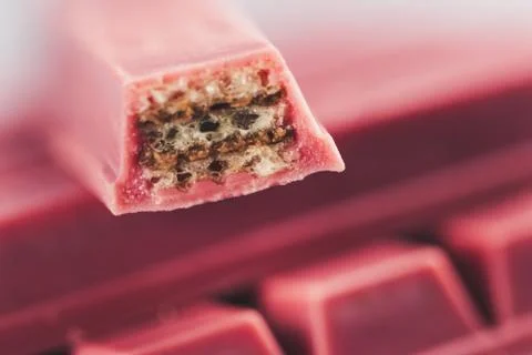 Finger Ruby Chocolate Bar made from ruby cocoa bean. New dimension of chocola Stock Photos
