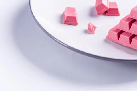 Finger Ruby Chocolate Bar made from ruby cocoa bean. New dimension of chocola Stock Photos