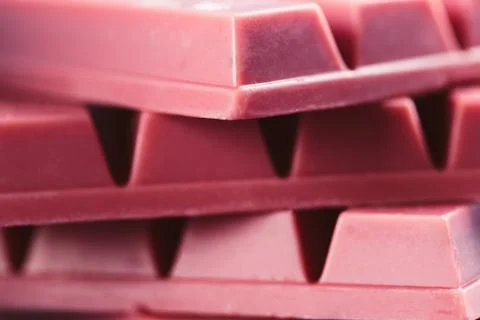 Finger Ruby Chocolate Bar made from ruby cocoa bean. New dimension of chocola Stock Photos