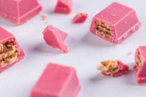 Finger Ruby Chocolate Bar made from ruby cocoa bean. New dimension of chocola Stock Photos