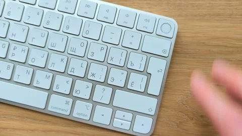 Finger scanning Touch ID on a modern computer keyboard. Top view of biometr.. Stock Footage 342540737