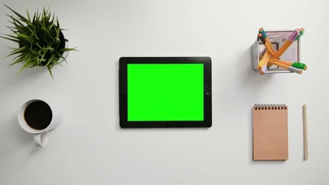 A Finger Scrolling on the Green Touchscreen Stock Footage