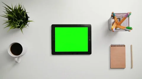 A Finger Scrolling on the Green Touchscreen Stock Footage 83744790