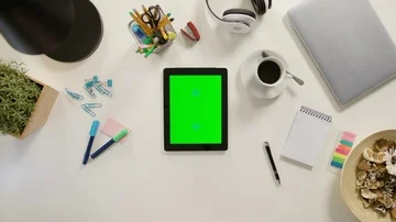 A Finger Scrolling on the Green Touchscreen Stock Footage 86042366