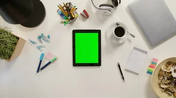 A Finger Scrolling on the Green Touchscreen Stock Footage 86044032