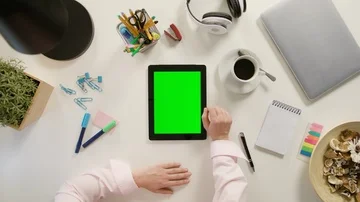 A Finger Scrolling on the Green Touchscreen Stock Footage 86044428