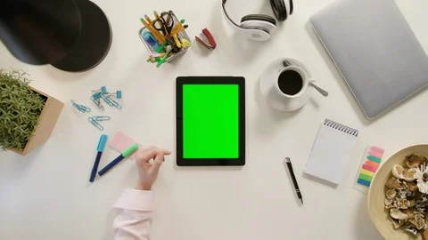 A Finger Scrolling on the Green Touchscreen Stock Footage 86044841