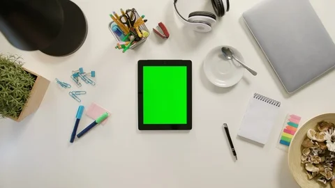 A Finger Scrolling on the Green Touchscreen Stock Footage 86047059