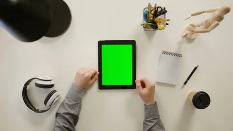 A Finger Scrolling on the Green Touchscreen Stock Footage 86096451