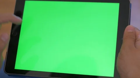 Finger Selecting Logo on Green Screen Device Stock Footage 116843408
