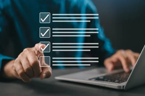 Finger selecting virtual checklist interface, task management planning, bus.. Stock Photos