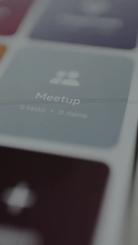 Finger selects the category labeled Meetup with active tasks to complete from a Stock Footage 328813997