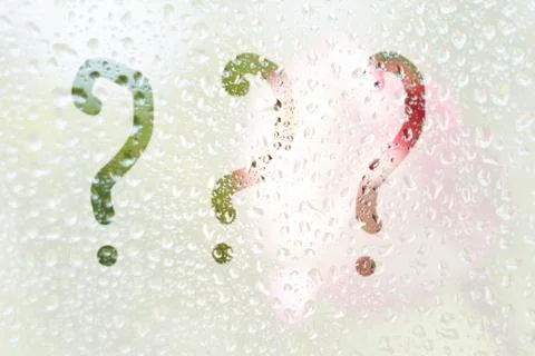 Finger-shaped pattern of question mark stripes on translucent fogged glass. r Stock Photos