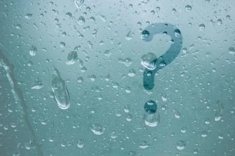 Finger-shaped pattern of question mark stripes on translucent fogged glass. r Stock Photos