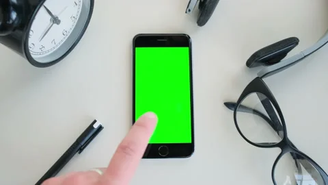 A Finger Taping on the Smartphone Stockbeeldmateriaal 170558496