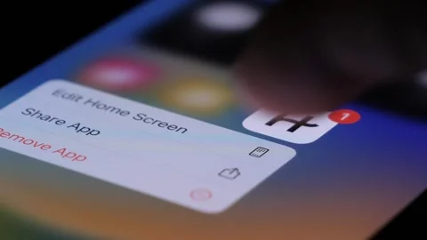 Finger Tapping On Hinge Icon On Phone Screen And Deleting App. Close Up Stock Footage 247871764