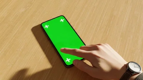 Finger Tapping Smartphone Green Screen Mockup 4K Close-up of a hand tapping.. Stock Footage 312076683