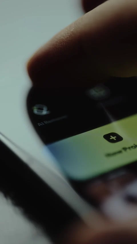Finger taps the AI Remover app icon, removing or editing elements within images Stock Footage 327523749