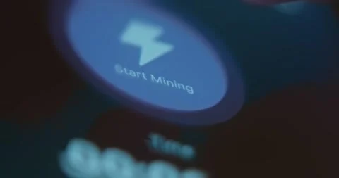 Finger taps the button Start Mining Stock Footage 323366794