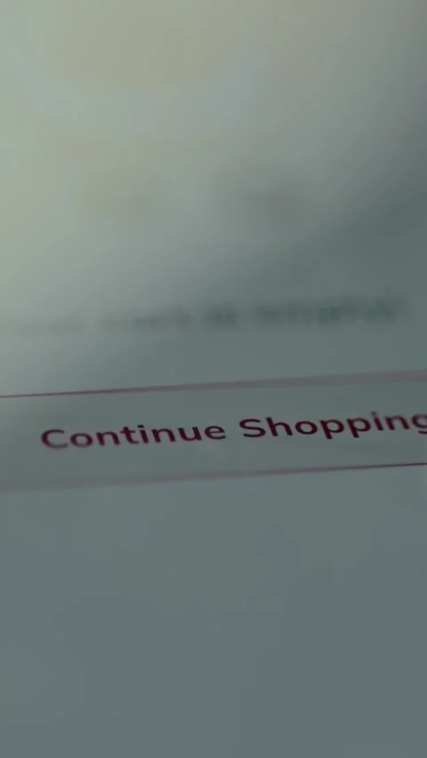 Finger taps the Continue Shopping button from the online store Stock Footage 327901166