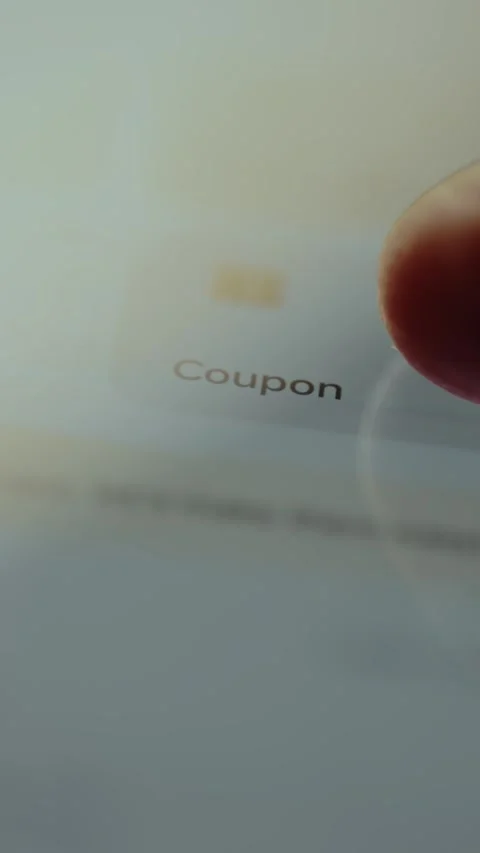 Finger taps the Coupon option, e commerce concept Stock Footage 327901336