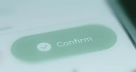 Finger taps the green button Confirm, the confirmation of data Stock Footage 313425219