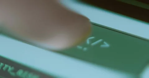 Finger taps a green button with word HACK Stock Footage 323369667