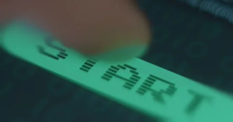 Finger taps a green Start button, hacker style Stock Footage 323366835