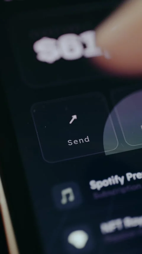 Finger taps the Send button, person initiates a payment Stock Footage 331577926