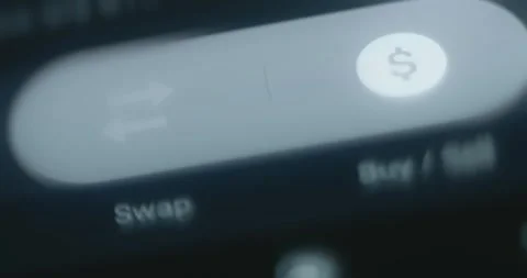 Finger taps the Swap button on crypto wallet app Stock Footage 314454995