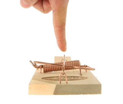 Finger testing mousetrap symbol test trap traps Stock-Fotos