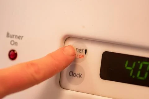 Finger To Timer Button Stock Photos