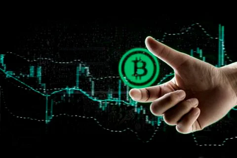 Finger touch application for bit coin symbol 写真素材