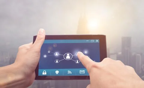 Finger touch tablet screen with social network Stock Photos