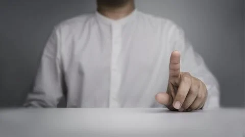 Finger touch on virtual touch screen gesture by business person in white shir Stock Photos