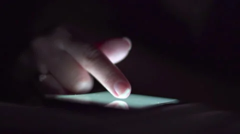 Finger touch white screen Mobile telephone in the darkroom Stock Footage 67807277