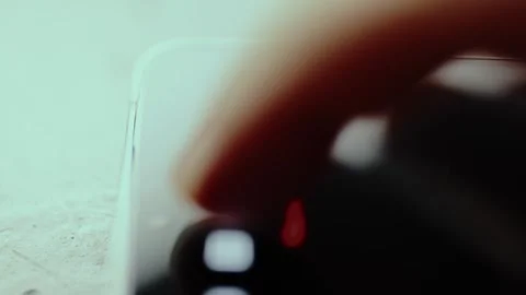Finger is touching a camera icon on smartphone screen Stock Footage 326946461