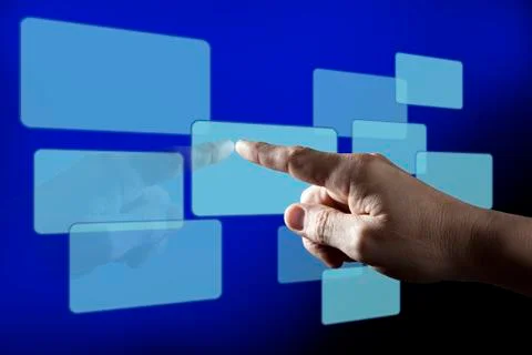 Finger touching digital touch screen Stock Photos