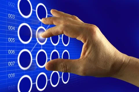 Finger touching digital touch screen Stock Photos