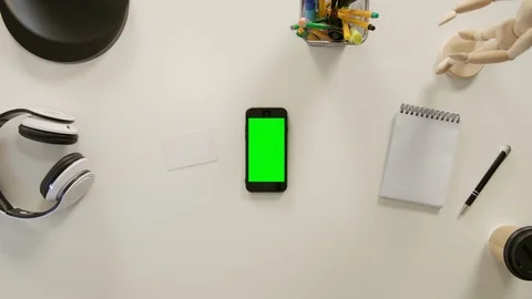 A Finger Touching a Green Screen of the Smartphone Stock Footage 86103451