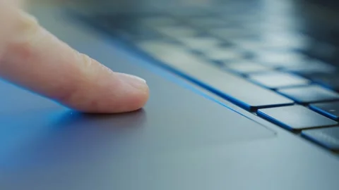 Finger touching pad on laptop computer with fingerprint recognition technology Stock Footage 345089479