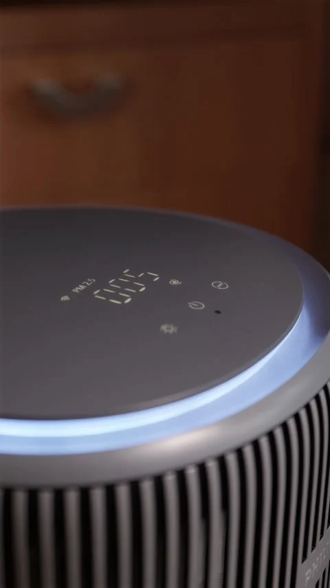 Finger touching screen panel on smart air purifier vertical 库存影片 343872654