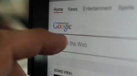 Finger touching search engine on tablet computer Video stock 41680157