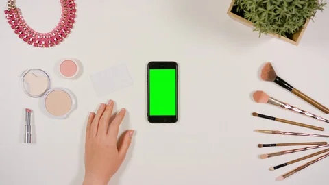 A Finger Touching a Smartphone with a Green Screen Stock Footage 85478532