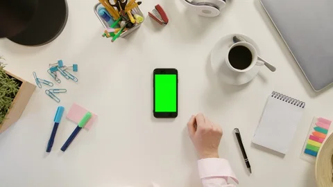 A Finger Touching a Smartphone with a Green Screen Stock Footage 86050573
