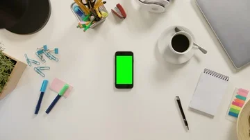 A Finger Touching a Smartphone with a Green Screen Stock Footage 86054016