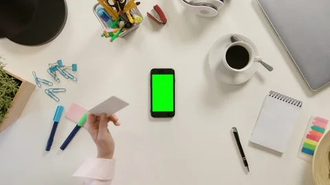A Finger Touching a Smartphone with a Green Screen Stock Footage 86090623