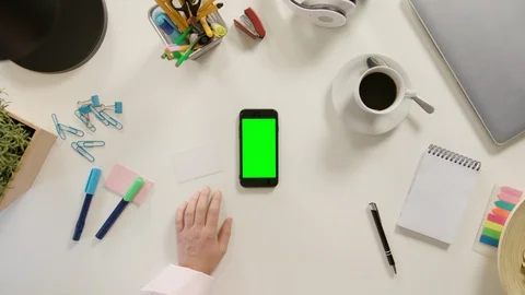 A Finger Touching a Smartphone with a Green Screen Stock Footage 86090809